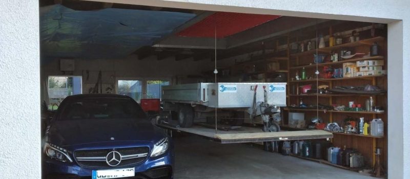 Garagenaufzug Hebe-Vorrichtung für eine Transportplattform Garagenaufzug Hebe-Vorrichtung für eine Transportplattform